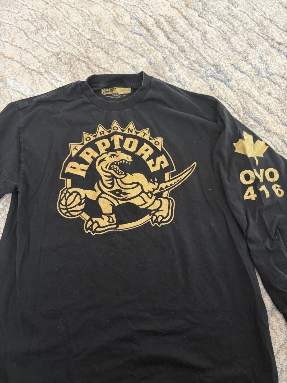 OVO Black Long Sleeve Raptors Logo Tee with Gold Graphics